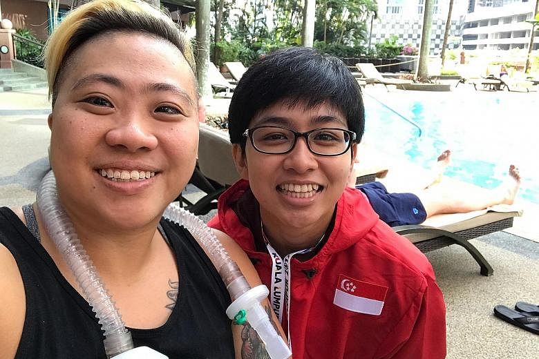 Para-swimmer Theresa Goh, a Paralympic bronze medallist, with Nur Aini Mohamad Yasli, a powerlifter making her Asean Para Games debut.