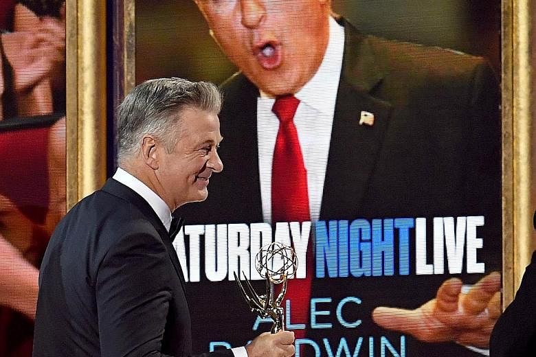 Alec Baldwin (above) won best supporting actor in a comedy series for his portrayal of Mr Trump in Saturday Night Live.