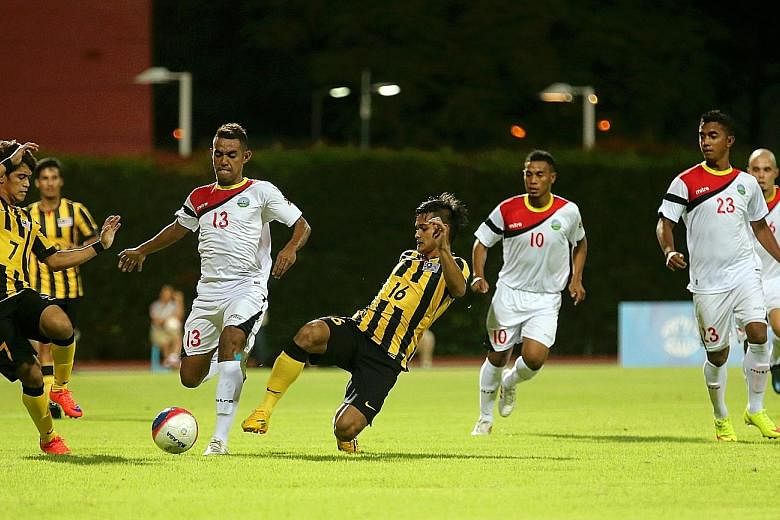 A SEA Games 2015 football match between Malaysia and Timor Leste on May 30, 2015, where Malaysia won 1-0. A Singaporean was jailed for attempting to fix a match between the two countries in that year.