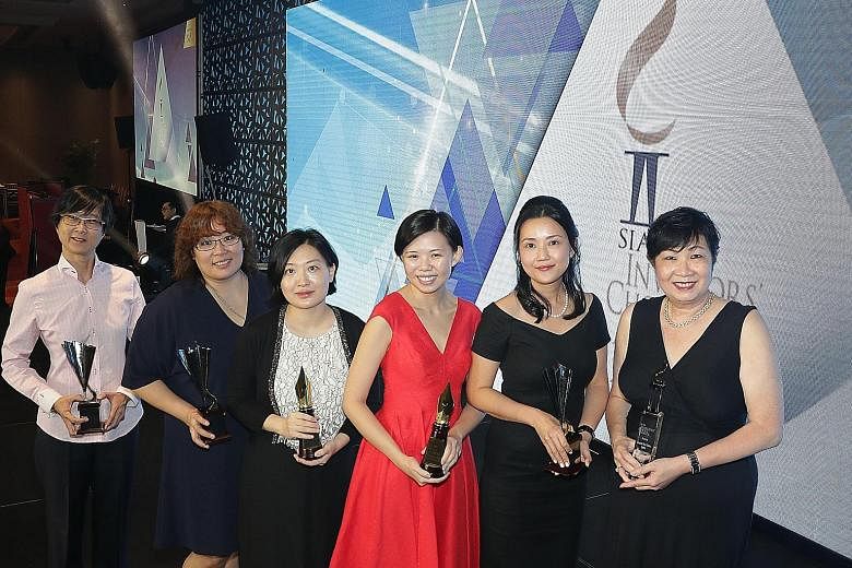 Award winners from SPH are (from left) Ms Quek Suzane, Lianhe Zaobao associate business editor; Ms Grace Leong, Straits Times correspondent; Ms Hu Yuanwen, Lianhe Zaobao correspondent; Ms Jamie Lee and Ms Claire Huang, both Business Times corresponde