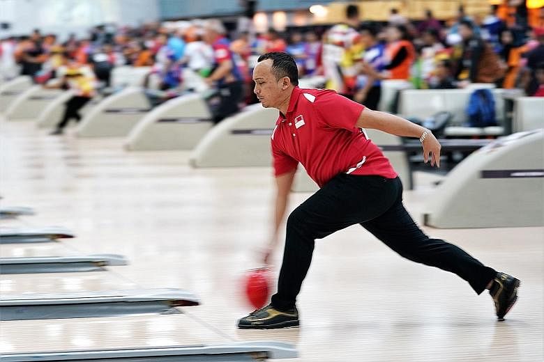 Ismail Hussain competing in the bowling TPB3 final at Sunway Mega Lanes. He picked up bowling in 2007 when he realised a strike sounded like crispy goreng pisang.