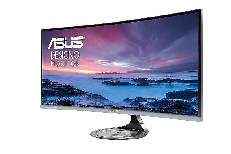 The Asus Designo Curve MX34VQ's semi-transparent base acts as a wireless charger for devices compatible with the Qi charging standard, such as the new iPhones and the latest Samsung flagship smartphones.