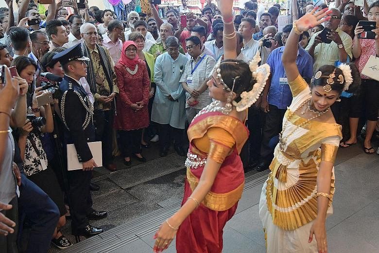 Dancers from the Rhythms Aesthetic Society performing for President Halimah Yacob yesterday. She was treated to both traditional North and South Indian dances. The President and her husband, Mr Mohamed Abdullah Alhabshee, were on a visit to Little In