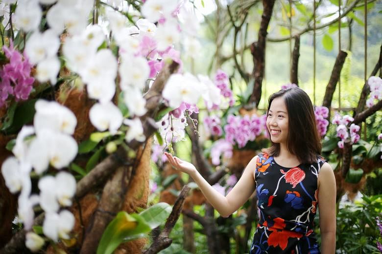 Ms Livia Chng at the Singapore Botanic Gardens. The 29-year-old last year set up Refresh Flowers, a social initiative that turns flowers used in weddings into bouquets for patients undergoing palliative care. It currently works with Assisi and HCA ho