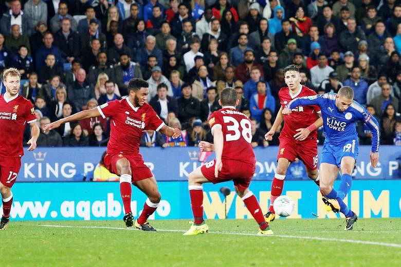 Leicester City's Islam Slimani scores their second goal in the 2-0 League Cup defeat of Liverpool on Tuesday. Jurgen Klopp's men had 70 per cent possession but the Foxes were inspired by Shinji Okazaki coming on as a substitute.
