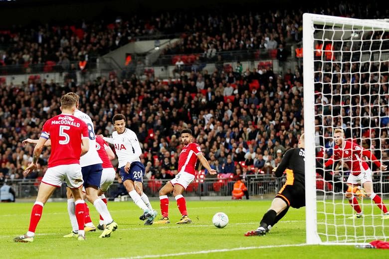 Tottenham midfielder Dele Alli (No. 20) scoring the game's only goal as Spurs saw off a plucky Barnsley side at Wembley on Tuesday. The England midfielder, who plundered his third goal of the season, will be a key man as Spurs battle for silverware o