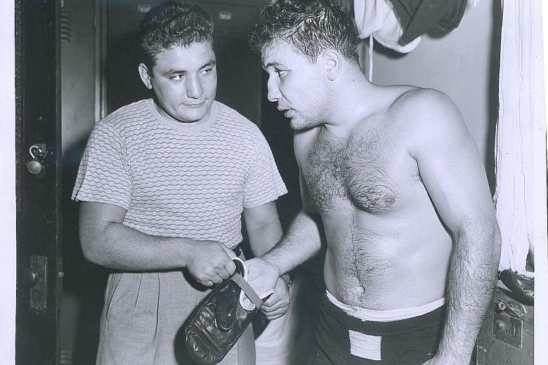 Jake LaMotta training in New York in 1949, the year he captured the middleweight championship. Six years earlier, he became the first man to defeat boxing great Sugar Ray Robinson.