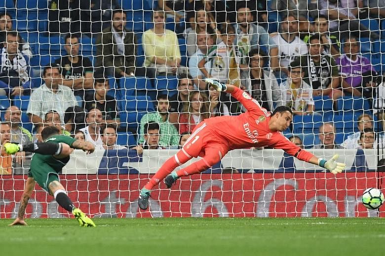 Real Betis forward Antonio Sanabria snatching all three points for his team after his header beat Real Madrid 'keeper Keylor Navas in the dying minutes of Wednesday's LaLiga match at the Santiago Bernabeu.