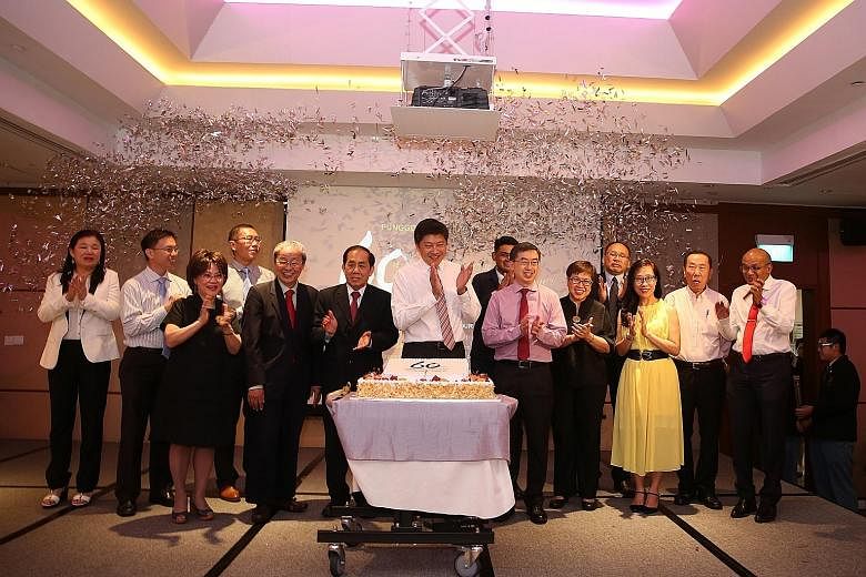 Punggol Secondary School celebrated its 60th anniversary this year with a dinner at Holiday Inn Atrium yesterday. The guest of honour was Minister for Education (Schools) Ng Chee Meng (centre), seen here with the school's principal Benedict Keh (cent