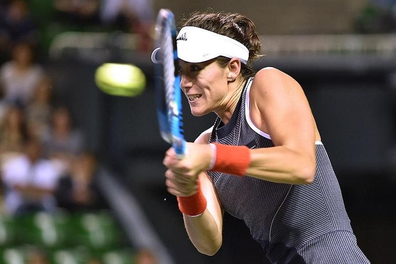 Garbine Muguruza on her way to beating France's Caroline Garcia 6-2, 6-4 in the quarter-finals of the Pan Pacific Open yesterday.