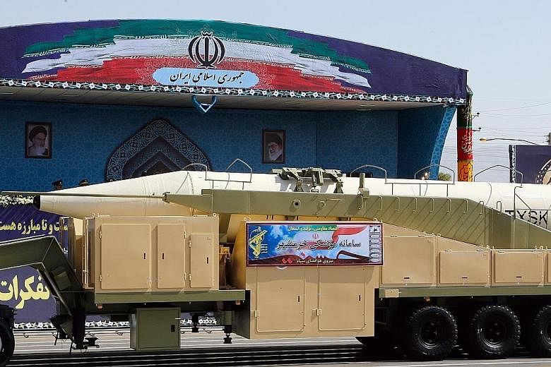 Iran yesterday showed off a new long-range missile, named Khoramshahr, during an annual military parade marking the Iraqi invasion in 1980. The missile is said to have a range of 2,000km.