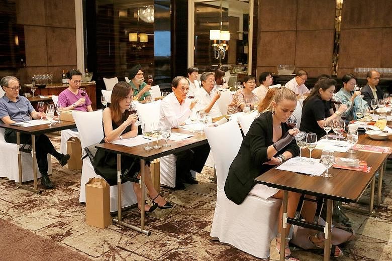 The masterclass held yesterday at the St Regis was attended by over 30 participants who each took home $135 worth of goodies. They got to taste six wines from Burgundy, including three not yet available on the market, and premium Pinot Noirs.