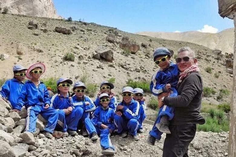 Mr Yip with children in Ladakh while on a trip organised by Singapore NGO Sight To Sky. Many people in the Indian region have vision problems because of exposure to the sun's ultraviolet rays. Mr Vince Yip, who brought award-winning Australian gelato