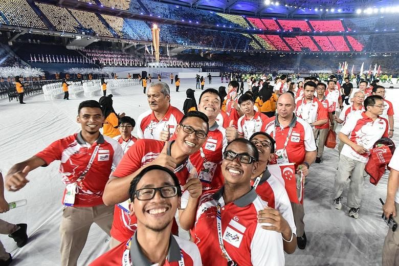 Singapore's para-athletes at the APG Closing Ceremony last night, They had a bountiful harvest of 50 medals (nine gold, 17 silver and 24 bronze).