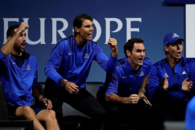 (From left) Marin Cilic, Rafa Nadal, Roger Federer and Tomas Berdych cheering on Team Europe against Team World in Prague. The Europeans swept the singles to lead 3-0 before Nadal and Berdych lost the doubles.