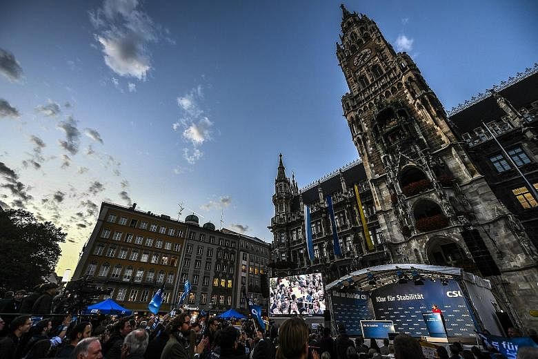 German Chancellor Angela Merkel campaigning at Marienplatz Square in Munich on Friday. Dr Merkel, who has dominated Germany's political life since 2005 and is expected to win another term, may find it to be her hardest yet.