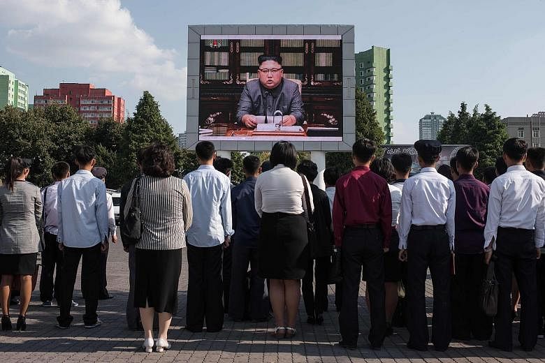 A news broadcast of a statement by North Korean leader Kim Jong Un on a public TV screen in Pyongyang last Friday.