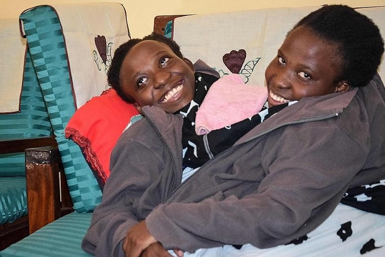 Sisters Maria and Consolata Mwakikuti, joined at the abdomen, have become minor celebrities in Tanzania, where the media has followed their path through high school and arrival at university.
