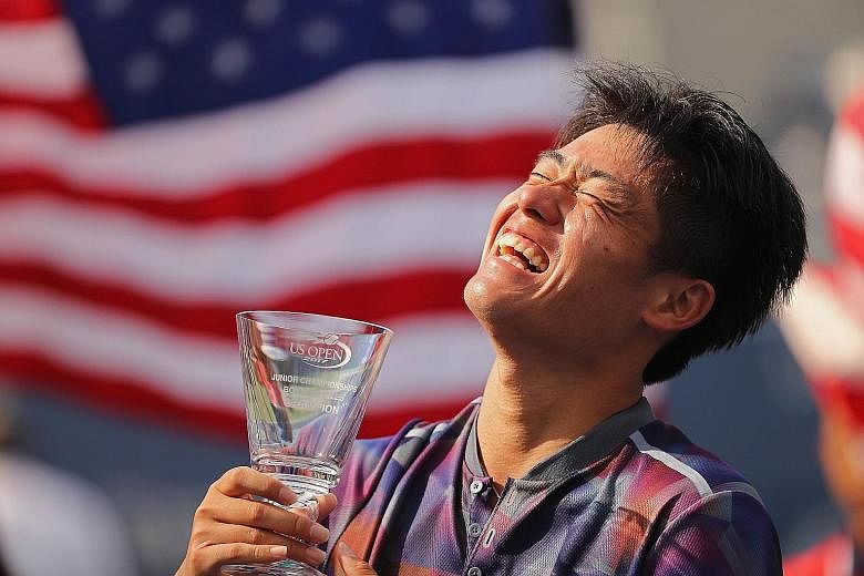 Wu Yibing with his US Open boys' singles trophy after defeating top seed Axel Geller of Argentina 6-4, 6-4 in the final this month.