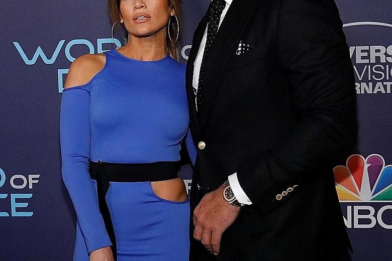 Singer Jennifer Lopez with her boyfriend, former baseball player Alex Rodriguez (both above), in West Hollywood, California, last week.