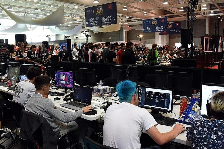 Video-game players at the eSports World Convention in Bordeaux last July. The global eSports industry is forecast to reach US$1.1 billion (S$1.5 billion) by the end of this year, with Asia the biggest region, accounting for more than US$328 million i