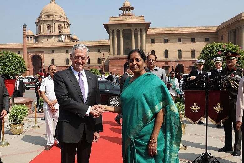 Indian Defence Minister Nirmala Sitharaman with US Secretary of Defence James Mattis upon his arrival at the Indian Defence Ministry in New Delhi yesterday. After talks with General Mattis, Ms Sitharaman said India was prepared to increase training f