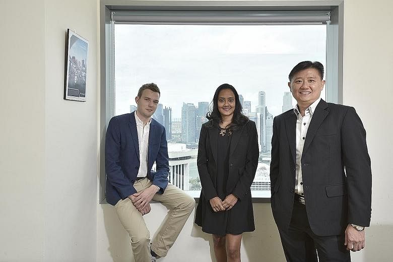 Smartly CEO and co-founder Artur Luhaaar, compliance officer Sheila Panja and VCG Partners CEO and executive director Jason Ng. Smartly is a robo-advisory investment platform targeted at retail investors who do not want the fuss of picking out and th