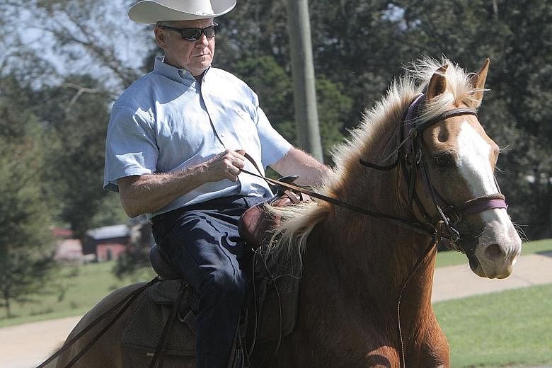 Mr Roy Moore's defiance of the establishment has made him a local hero to many in Alabama, and he is expected to win the contest to become the state's next senator.