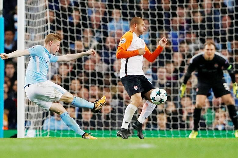 Midfielder Kevin de Bruyne strikes in the 48th minute to put City into the lead in their Champions League game against Shakhtar on Tuesday. Team-mate Sergio Aguero missed a penalty but Raheem Sterling sealed the win.