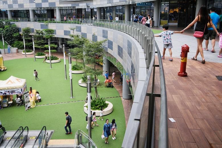 Older towns such as Ang Mo Kio have hawker centres and street-level shops where residents can mingle, features lacking in newer estates with their mall-based neighbourhood centres like Punggol's Waterway Point (above).