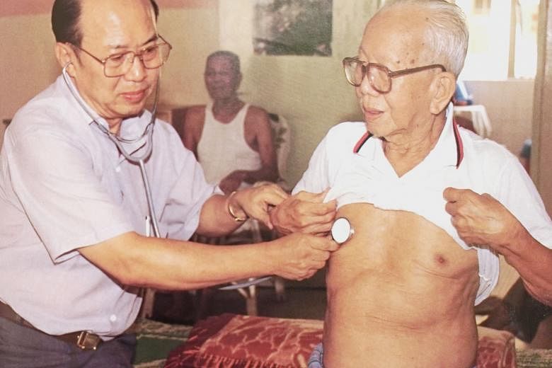 Dr Khoo volunteering at the Rochor Kongsi Home for the Aged, in this photo taken in 1989. He was one of the grassroots leaders who founded the home. Dr George Khoo Swee Tuan at his new clinic in Veerasamy Road. He moved there last year after running 