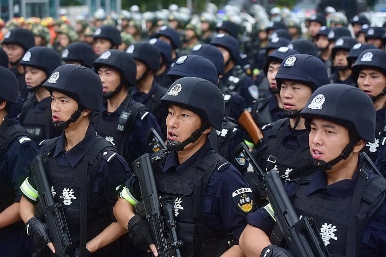 Special force police officers taking part in a security oath-taking drill in Sichuan province this week, ahead of the 19th National Congress of the Chinese Communist Party next month.