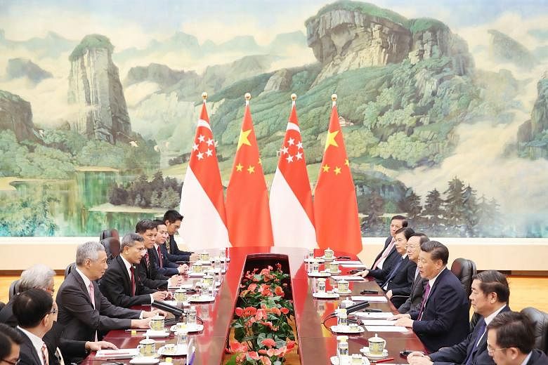 Prime Minister Lee Hsien Loong and Chinese President Xi Jinping at a meeting between the Singapore and Chinese delegations during PM Lee's official visit to Beijing last week. With China's progress, the dynamics of the bilateral relationship has chan