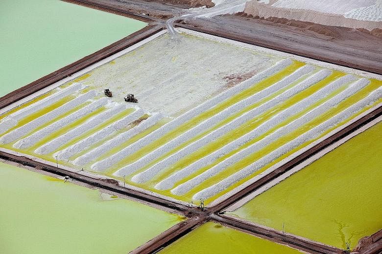 The brine pools and processing areas of the Soquimich lithium mine on the Atacama salt flat in Chile.