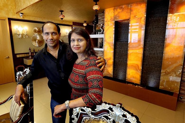 Mr Rajesh Bafna and his wife Priti in their 3,778 sq ft, five-bedroom penthouse at Waterview condominium in Tampines.
