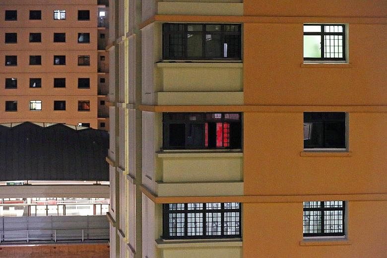 Over a span of two hours, The Straits Times spotted at least five men who looked to be between the ages of 20 and 60 entering the unit, which is in an HDB block about five minutes from Pioneer MRT station.
