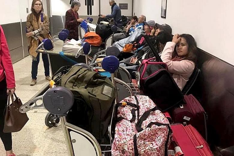 Some passengers had to spend a night at Sydney Airport due to the delay, which was caused by a defect in a circuit board.