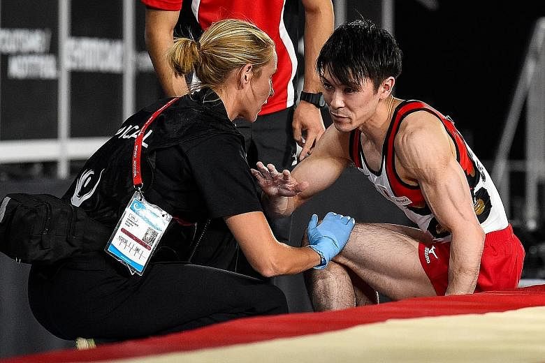 Kohei Uchimura competing on the vault on the opening day of the Artistic Gymnastics World Championships in Montreal, Canada on Monday. He was eliminated during qualifying after suffering an ankle injury. The Japanese gymnast has held the all-around t