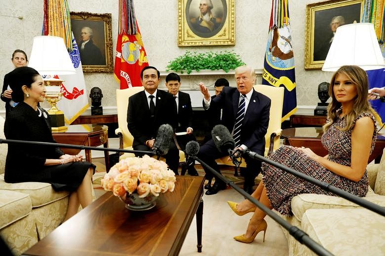 US President Donald Trump and First Lady Melania Trump welcoming Thai Prime Minister Prayut Chan-o-cha and his wife Naraporn in the Oval Office of the White House on Monday. US-Thailand ties, which had cooled after the 2014 Thai coup, are now back on