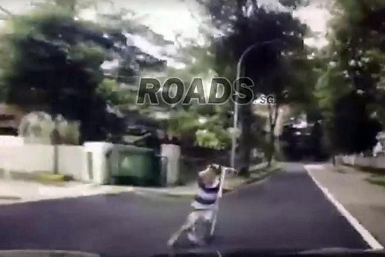 A series of screengrabs from the dashcam footage, posted on Facebook, that shows the boy being hit. The boy is seen crying on the road, while a woman runs towards him. He was taken conscious to National University Hospital.