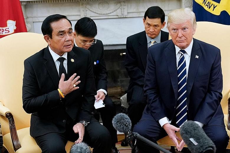 Thai Prime Minister Prayut Chan-o-cha with US President Donald Trump in the White House on Monday. Mr Prayut said he had a new friend in Mr Trump, and was "deeply appreciative" of being invited there.