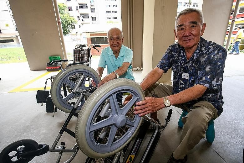 Mr Tan Tan Tong, 84, (far left) and Mr Tan Seng Kin, 73, are among the 30 from the five senior activity centres who will be trained to service wheelchairs for other low-income seniors, as part of a three-year pilot programme.