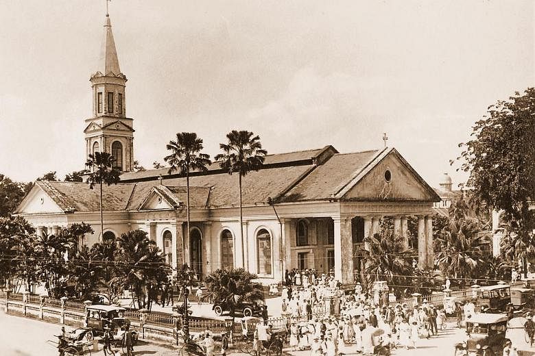 The cathedral in the 1910s. Constructed between 1843 and 1847, it is Singapore's oldest Catholic place of worship. It was gazetted as a national monument in 1973. Doing God's work are (from left) volunteer Alexander Charles Louis; Father Adrian Antho