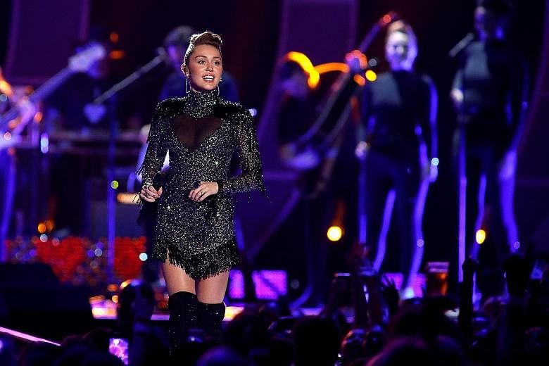 Miley Cyrus performing at the iHeartRadio Music Festival in Las Vegas last month.