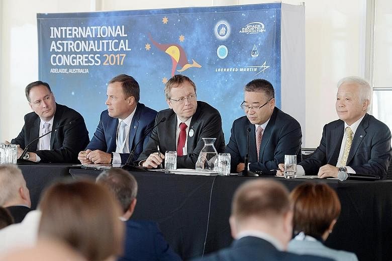 (From left) US National Aeronautics and Space Administration acting administrator Robert Lightfoot, Russian Roscosmos State Corporation for Space Activities head Igor Komarov, European Space Agency director-general Jan Woerner, China National Space A