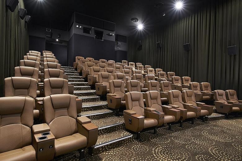 At GV Paya Lebar, grab exclusive food items at its Grab & Gold Cafe (above), or watch a screening in comfort in its premium-class Duo Deluxe auditorium (below), which has larger seats and better back support.
