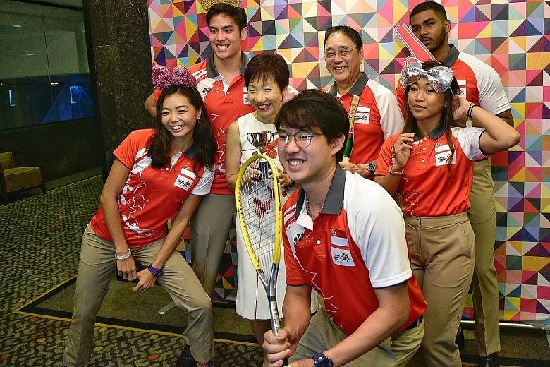 From left: National athletes Michelle Sng (athletics), Mark Leong (water skiing), Minister for Culture, Community and Youth Grace Fu, Jaris Goh (bowling), Singapore's chef de mission for the Kuala Lumpur Games Milan Kwee, Nurzuhairah Yazid and Sheik 