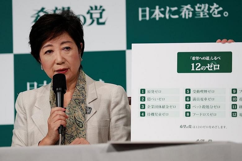 Tokyo Governor Yuriko Koike's Kibo No To party has made populist calls to freeze a scheduled sales tax hike in 2019 and phase out nuclear power, as part of an effort to set itself apart from the government on key issues.