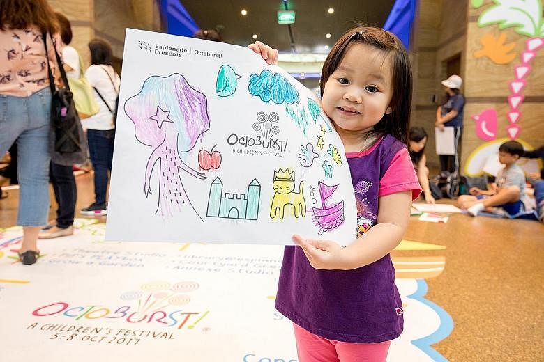 More than 900 children doodled and coloured to their hearts' content at art activities at the Esplanade - Theatres on the Bay on Children's Day yesterday. Children aged five to 12 took part in a drawing contest, while those aged two to four were invo