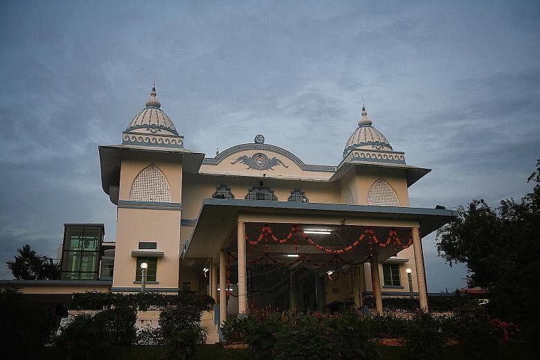 The blue-and-cream Sri Ramakrishna Temple is one of three conserved buildings at the Ramakrishna Mission.